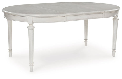 Montelaine Dining Extension Table - Pierce Furniture Gallery